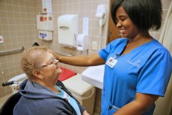 A member receives personal care at a Senior LIFE Health and Wellness Center.