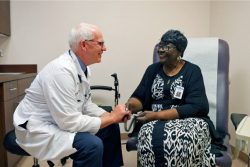 A member visits the doctor at a Senior LIFE Health and Wellness Center.